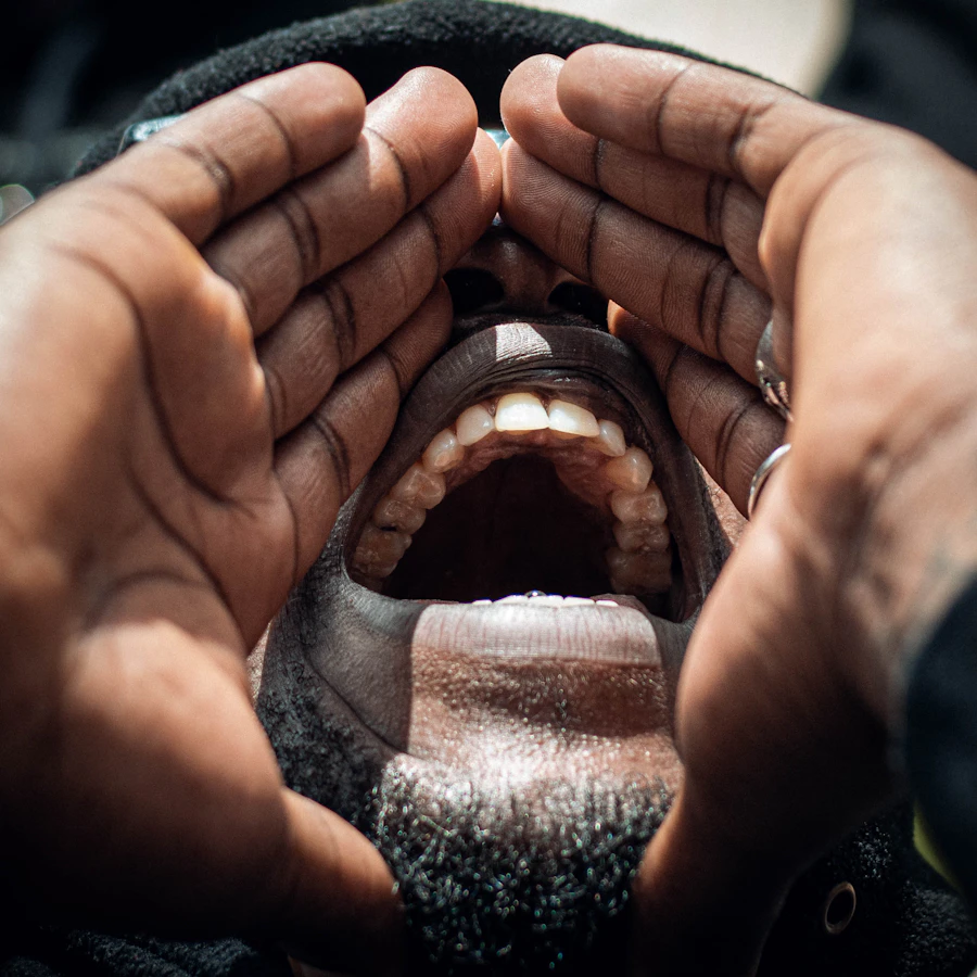 Close examination of a patient's mouth and throat